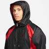 JORDAN ESSENTIALS WOVEN JACKET BLACK/GYM RED